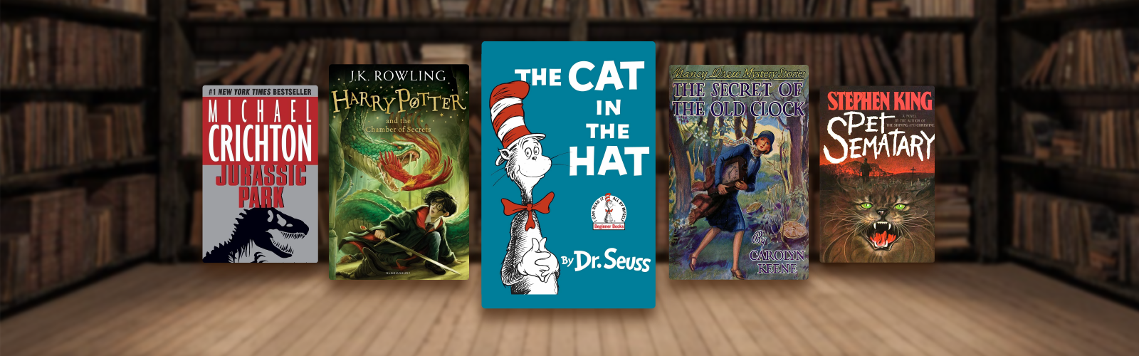 Cayman Islands Public Library Service website banner image featuring a Carousel of books including cat in the hat, harry potter and jurassic park